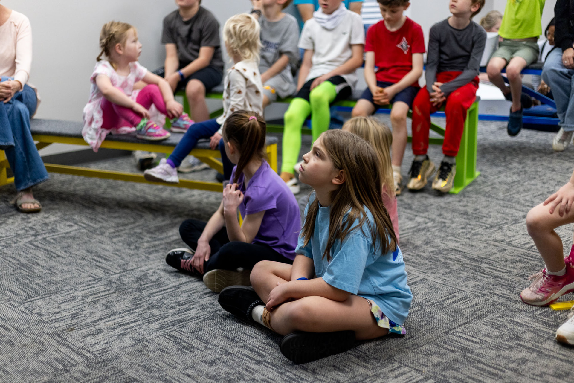 Kids listening to the Bible story during Navigators at East Cobb Church of Christ