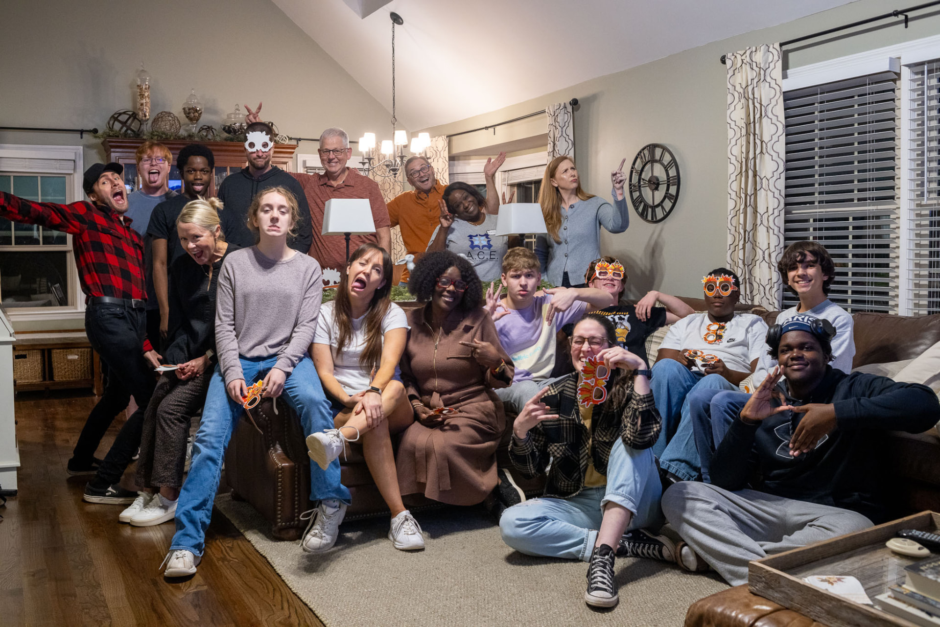 Students and leaders being goofy together at a home gathering