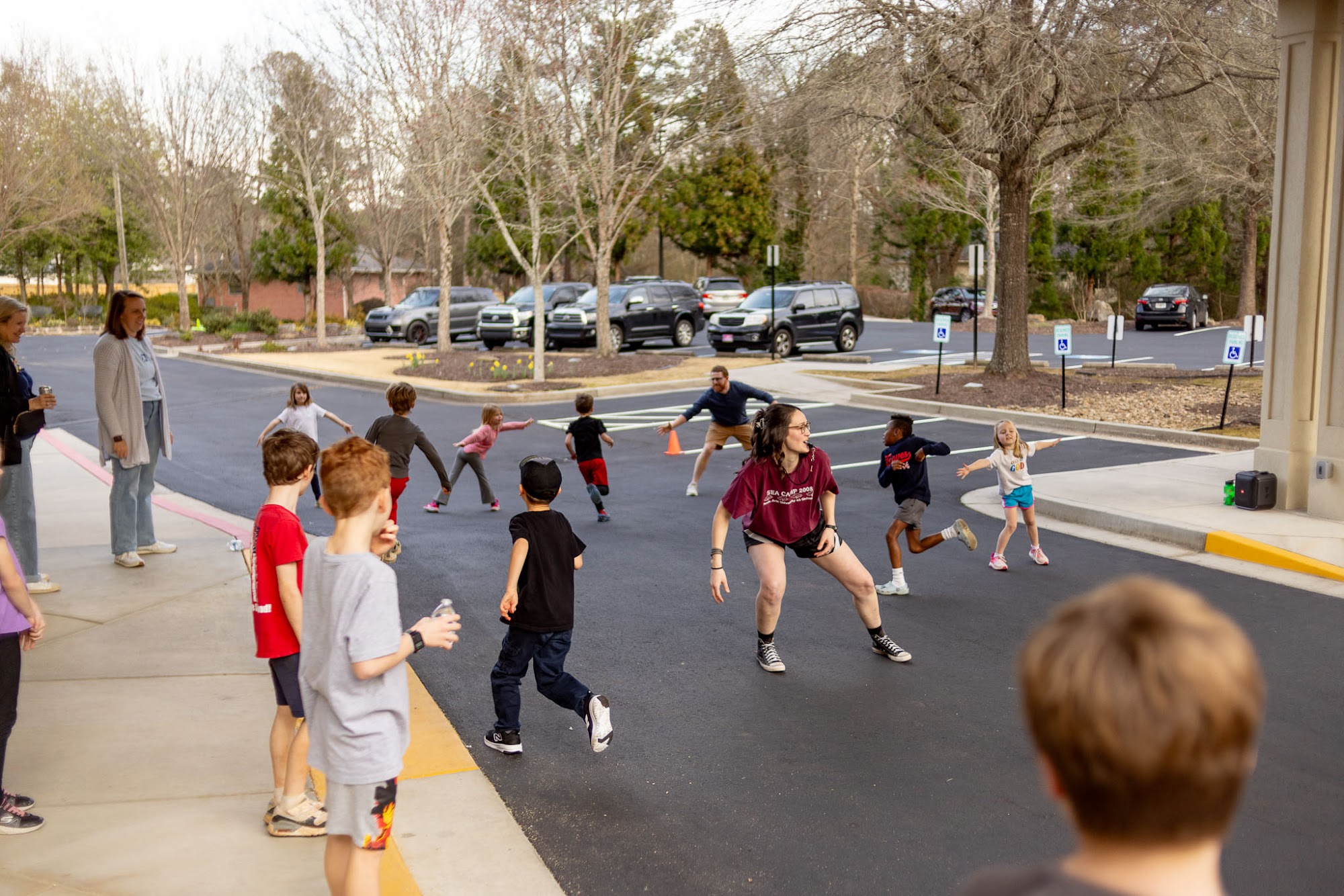Kids playing games outside on the church campus